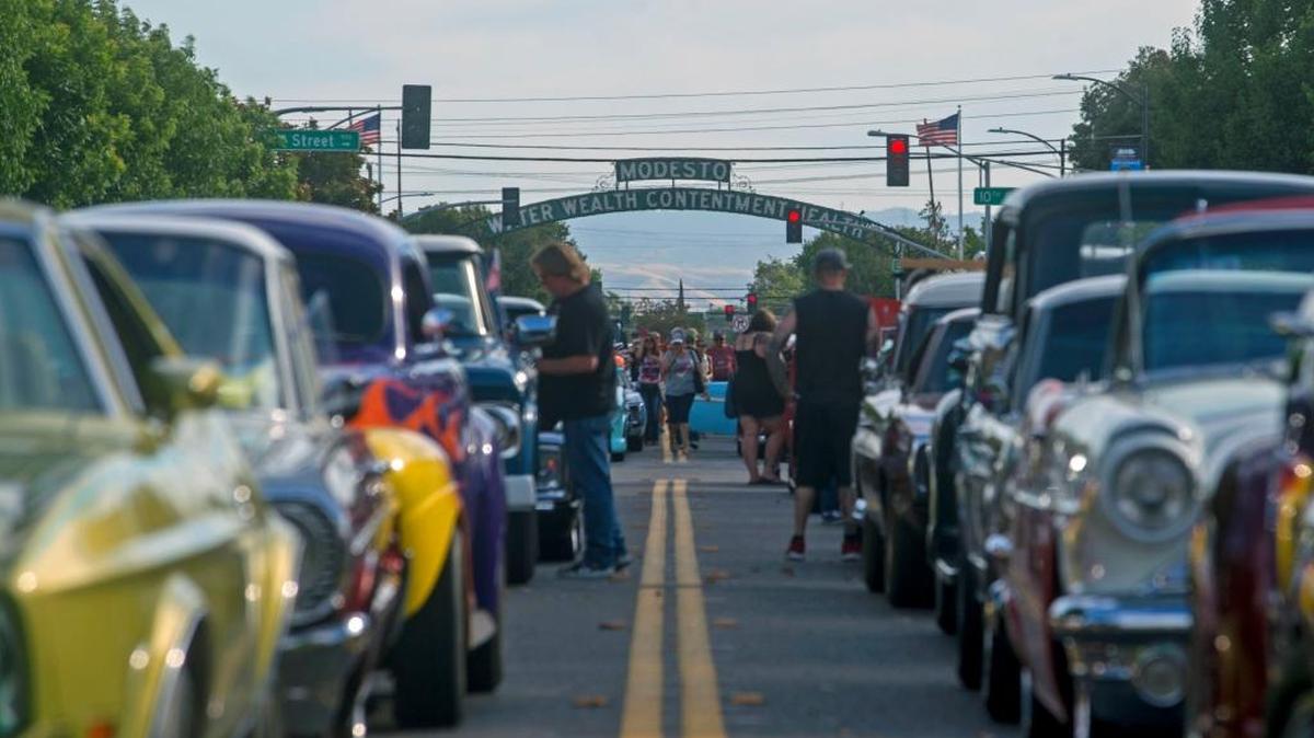 Classic cars line I street before the Modesto Graffiti Parade in Modesto on June 10, 2016.
