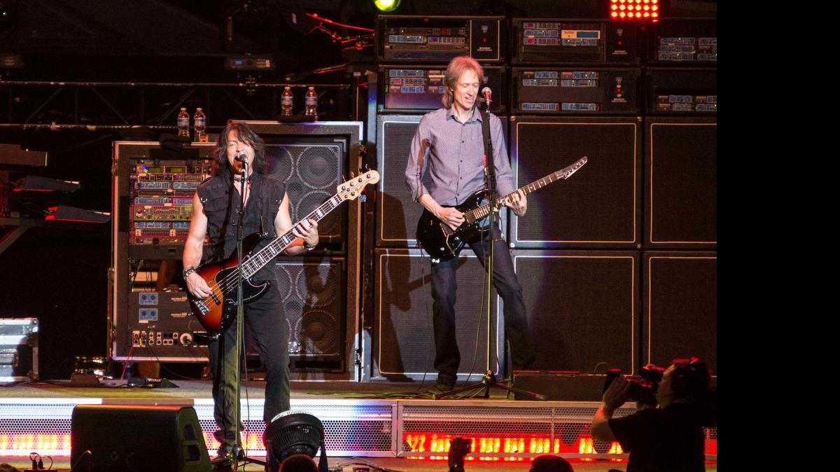 
The band Boston will play a double bill with REO Speedwagon at the Ironstone Amphitheatre July 25, 2015. FILE: Boston leadband members Gary Pihl (right) and Tracy Ferrie (left) performing as part of the Heaven On Earth Tour at Verizon Wireless Amphitheater at Encore Park on Saturday, June 14, 2014, in Atlanta. 
