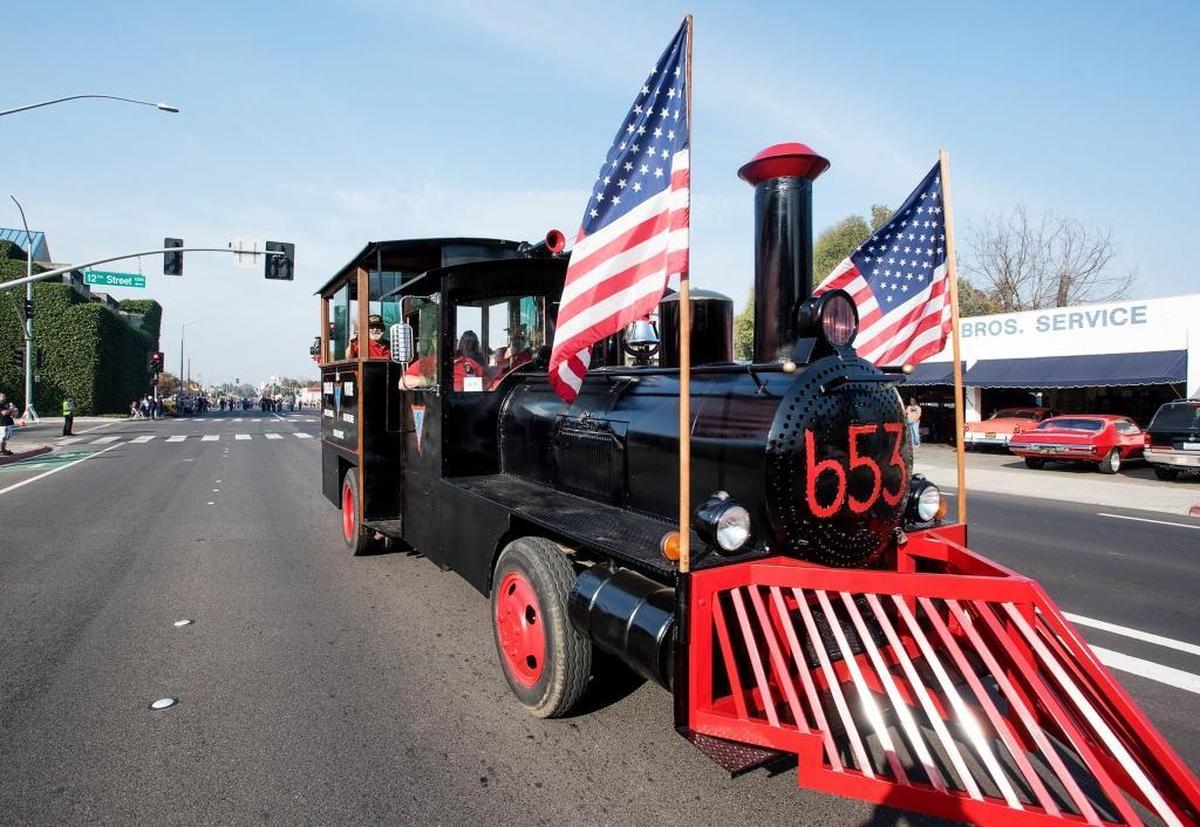 Stanislaus Voiture 653 parade vehicle drives down Needham Street during the 2016 Veterans Day Parade in Modesto.