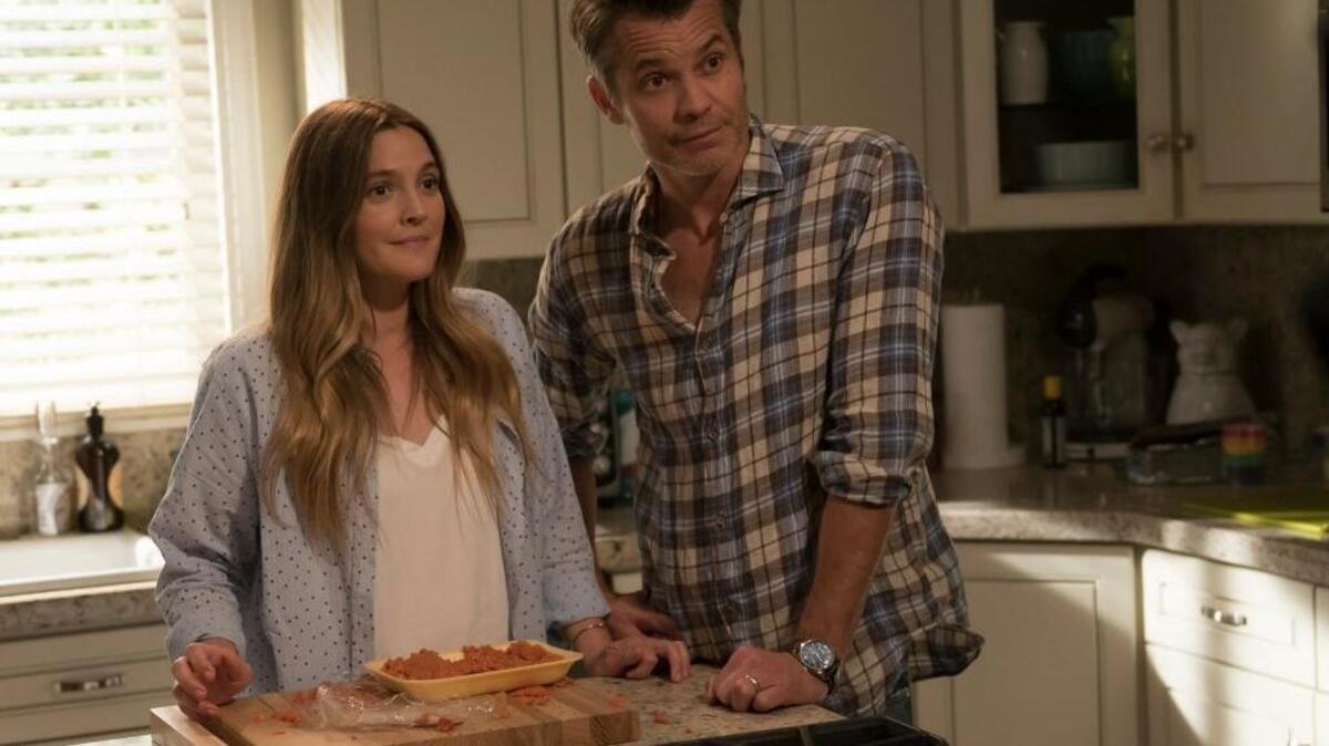 Joel (Timothy Olyphant), right, and Sheila (Drew Barrymore) are husband and wife Realtors living in the L.A. suburbs in the new Netlfix comedy “Santa Clarita Diet,” premiering Friday, Feb. 3.