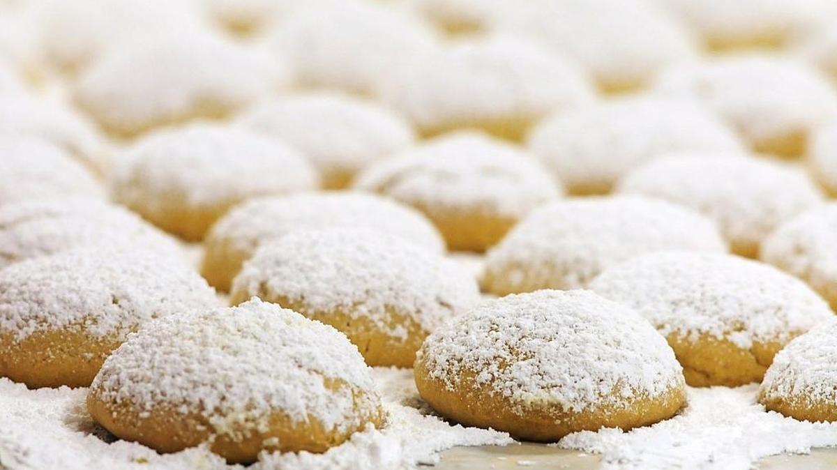 Hundreds of Kourambiethes, a traditional Greek butter cookie topped with powdered sugar, during a past year’s Greek Food Festival.