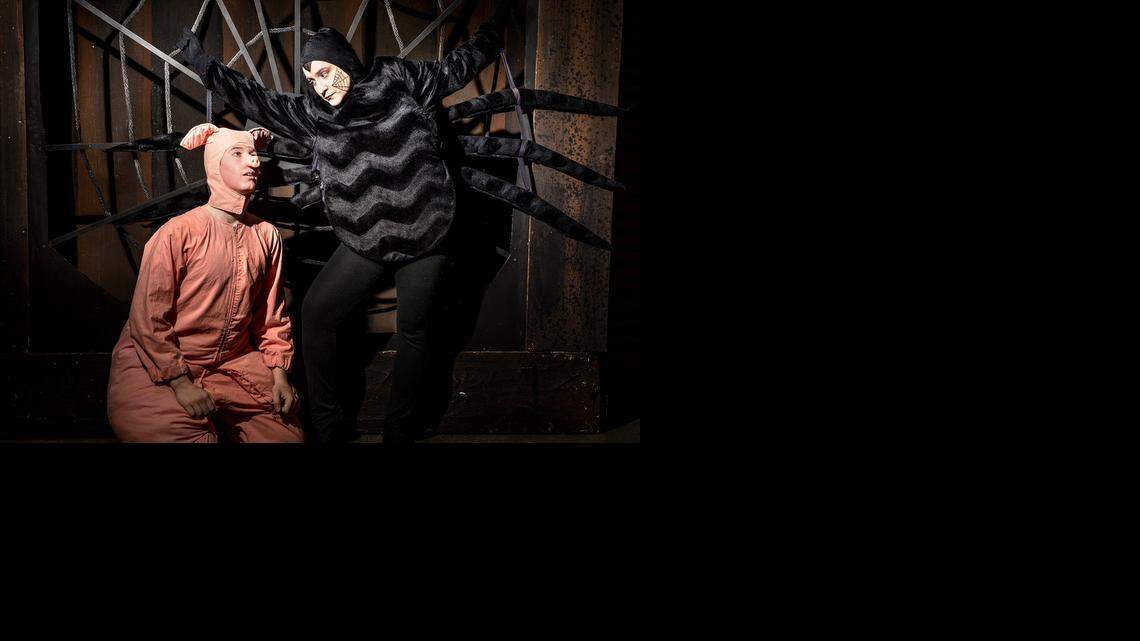 
Shane Tyler Smith is Wilbur the pig and Randi Lineé is Charlotte the spider in “Charlotte’s Web,” at Johansen High School.
