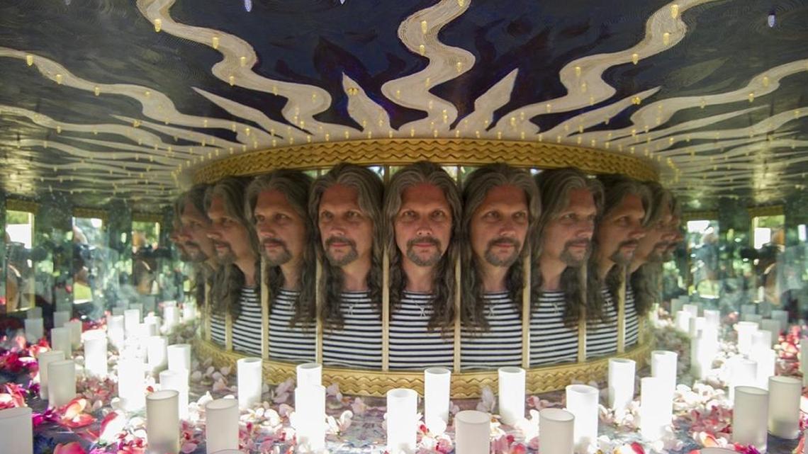 Modesto-raised Matt Elson brings his “The Infinity Boxes” exhibit to the Car negie Arts Center in Turlock. Pictured is the artist inside one of his creations.