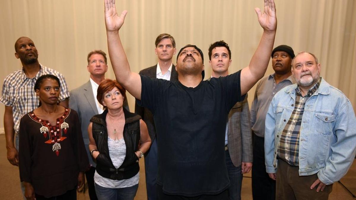 John Ervin, center, and other cast members prepare for “The Exonerated,” a play produced by the Gallo Center Repertory Company and Sankofa Theatre Company. The play tells the real-life stories of six convicted death-row inmates who were later exonerated and released. The play runs Friday-Saturday, July 8-9, 2016, at the Gallo Center.