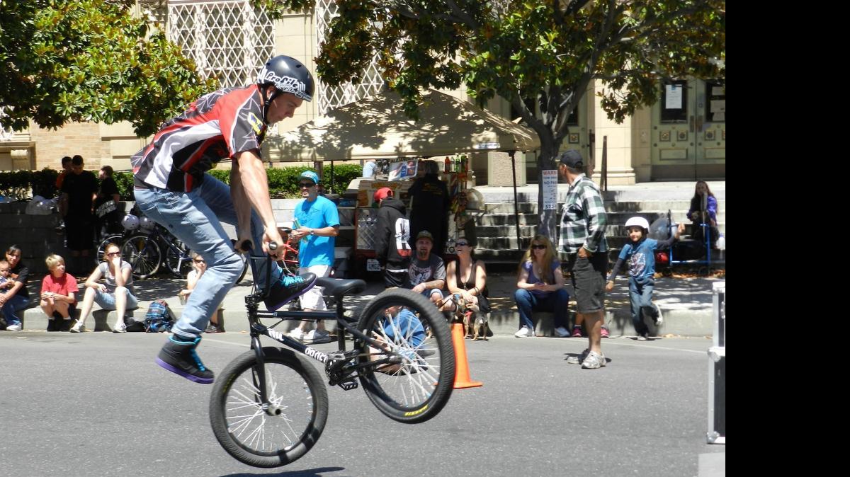 
Jared Eberwein of the BMX Pros Trick Team shows off his skills at the 2014 Family Cycling Festival.
