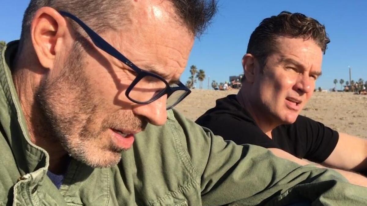 Mark Devine, left, and James Marsters in a scene from their web series, ‘Vidiots’