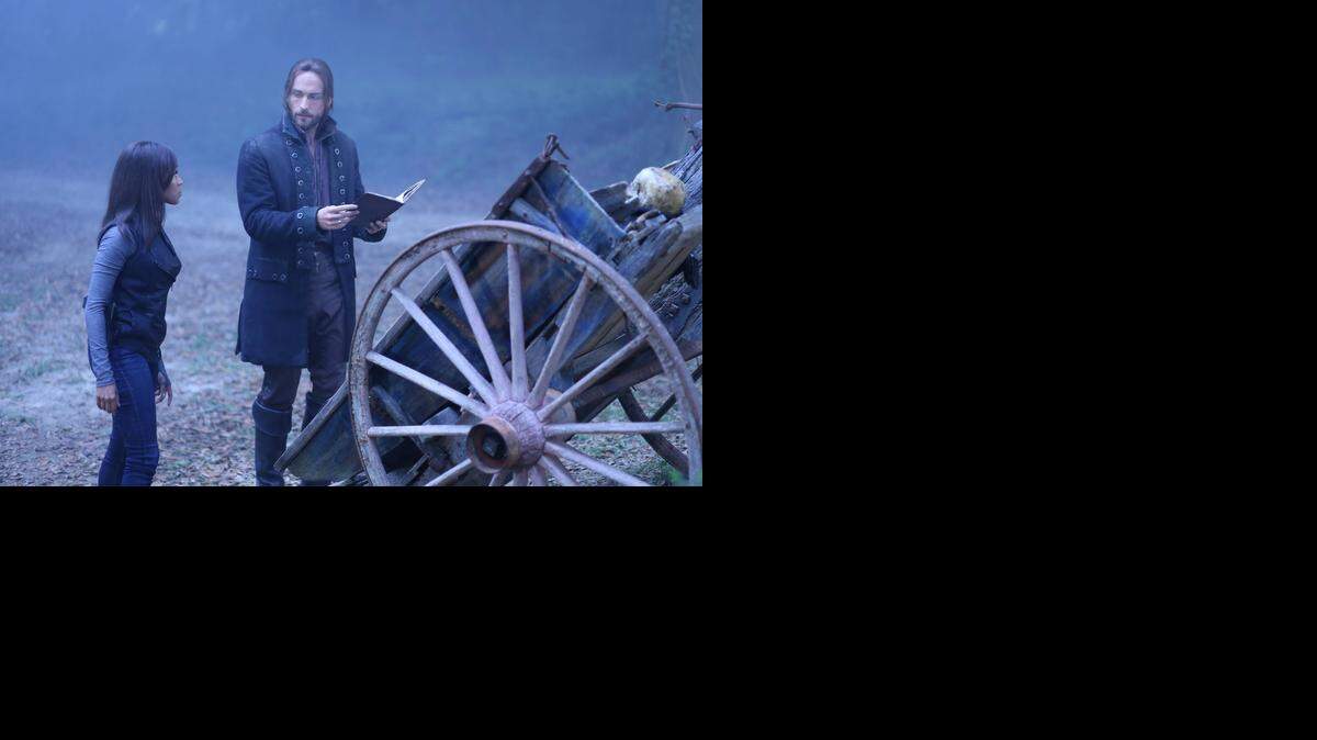 
Tom Mison, right, as Ichabod and Nicole Beharie, left, as Abbie, attempt to resurrect a Frankenstein-like monster in "Sleepy Hollow."

