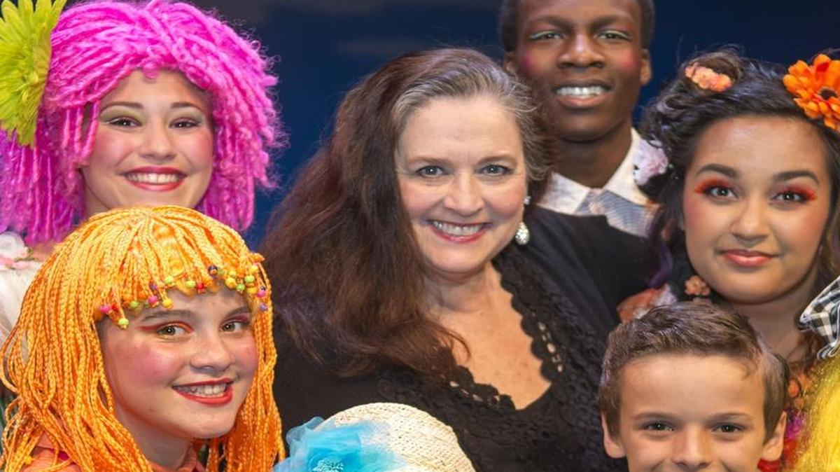 
Melanee Wyatt, YES Company founding artistic director, poses with the cast of “Mary Poppins.”
