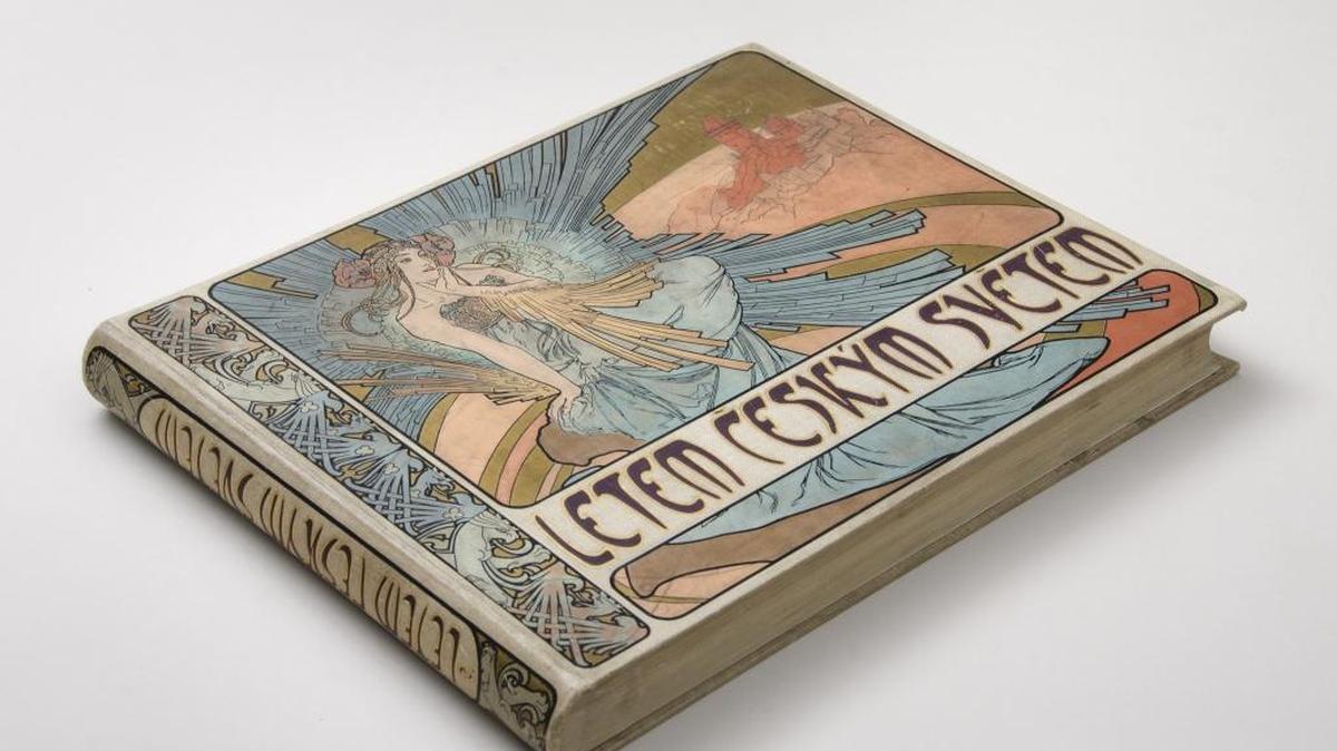 Alphonse Mucha: The Golden Age of Art Nouveau exhibit at the Carnegie Arts Center in Turlock. Pictured: Cover for a book, “Quickly Through the Czech World,” 1898