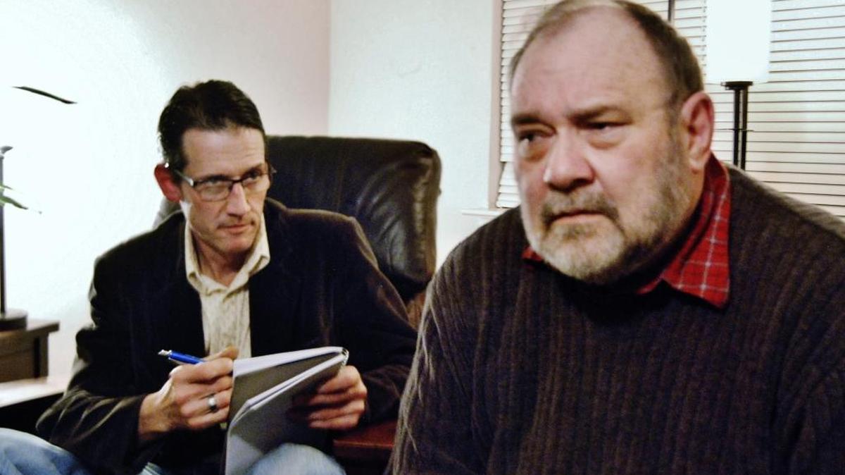 Roger Reinitz, left, and David Barbaree are featured in Center Stage Conservatory’s “Shining City.” The play runs through Feb. 26, at the company’s Lower Level Studio.