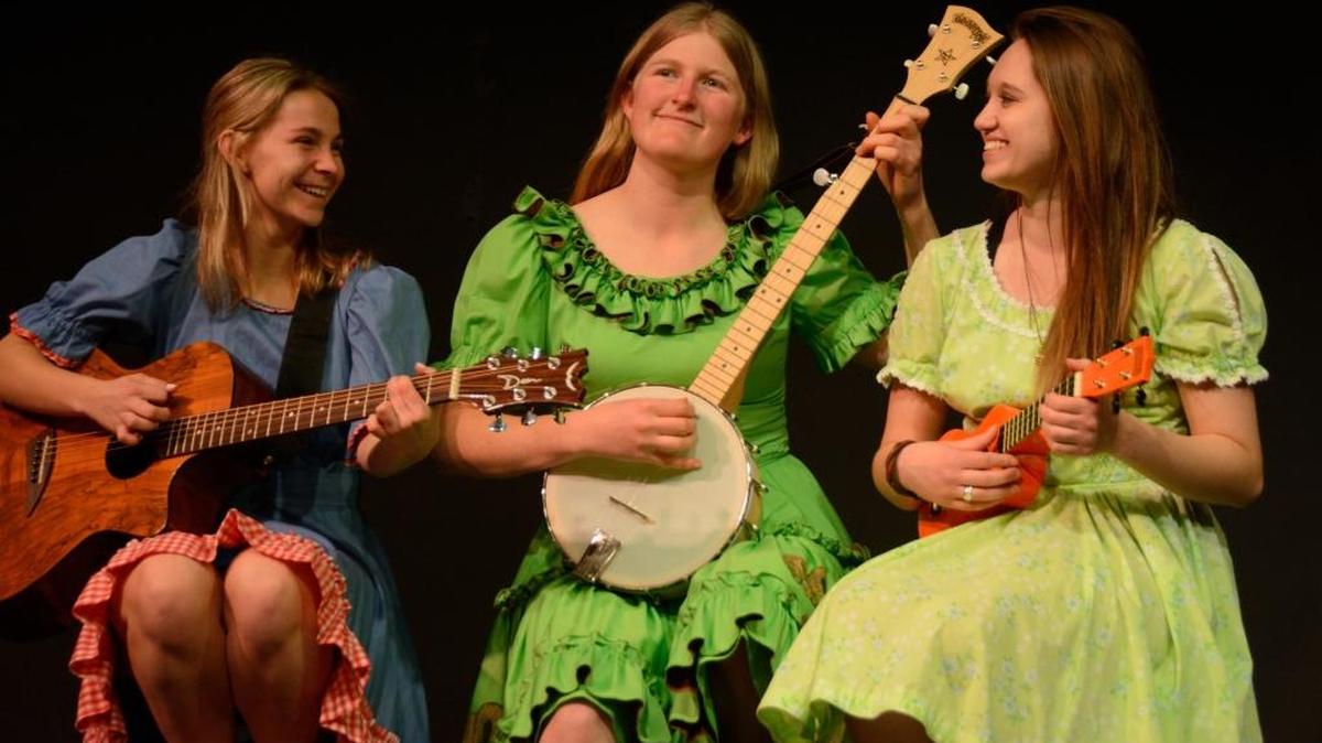 The all-female cast of “Cowgirls the Musical” will be acting, singing and playing their own instruments, says director Rocky Rhoades.