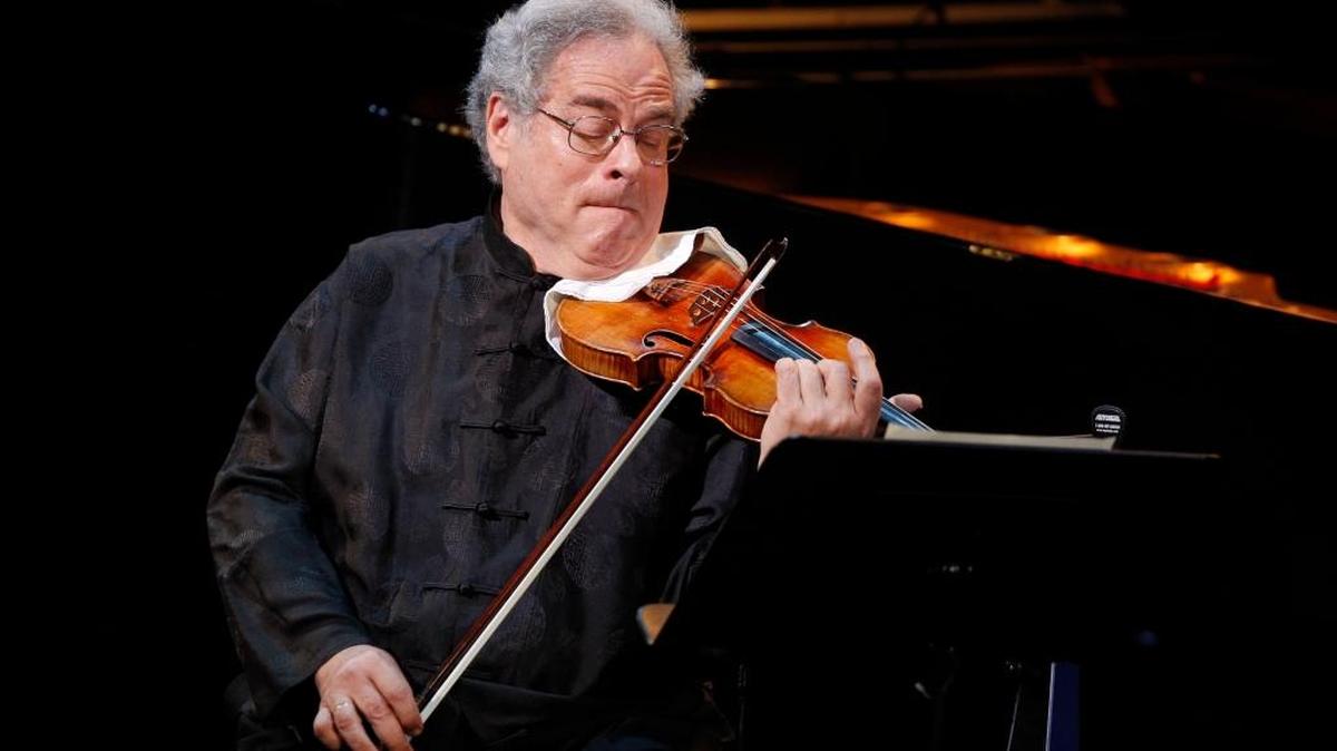 Itzhak Perlman performs during A Tribute to Marvin Hamlisch, a memorial concert, at The Juilliard School's Peter Jay Sharp Theater, Tuesday, Sept. 18, 2012 in New York. (Photo by Jason DeCrow/Invision/AP Images)