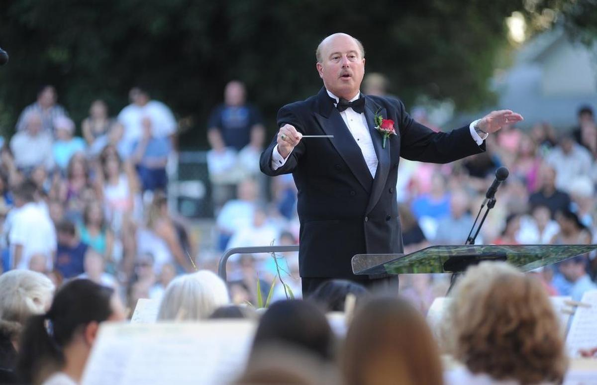 George Gardner conducts the Modesto Band of Stanislaus County during a MoBand Concert in the Park at Graceada Park’s Mancini Bowl in 2013.