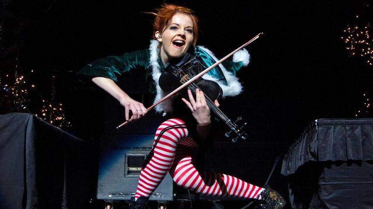 
Lindsey Stirling performs as part of the Star 94 FM Jingle Jam last month in Atlanta.
