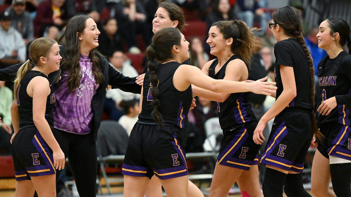 Escalon team members celebrate their 52-51 victory over Riverbank in the Trans Valley League game at Riverbank High School in Riverbank, Calif., Thursday, Jan. 4, 2024.