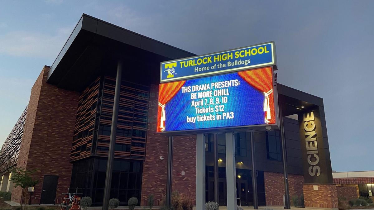 A sign outside Turlock High School advertises the musical “Be More Chill,” which was canceled after opening night.