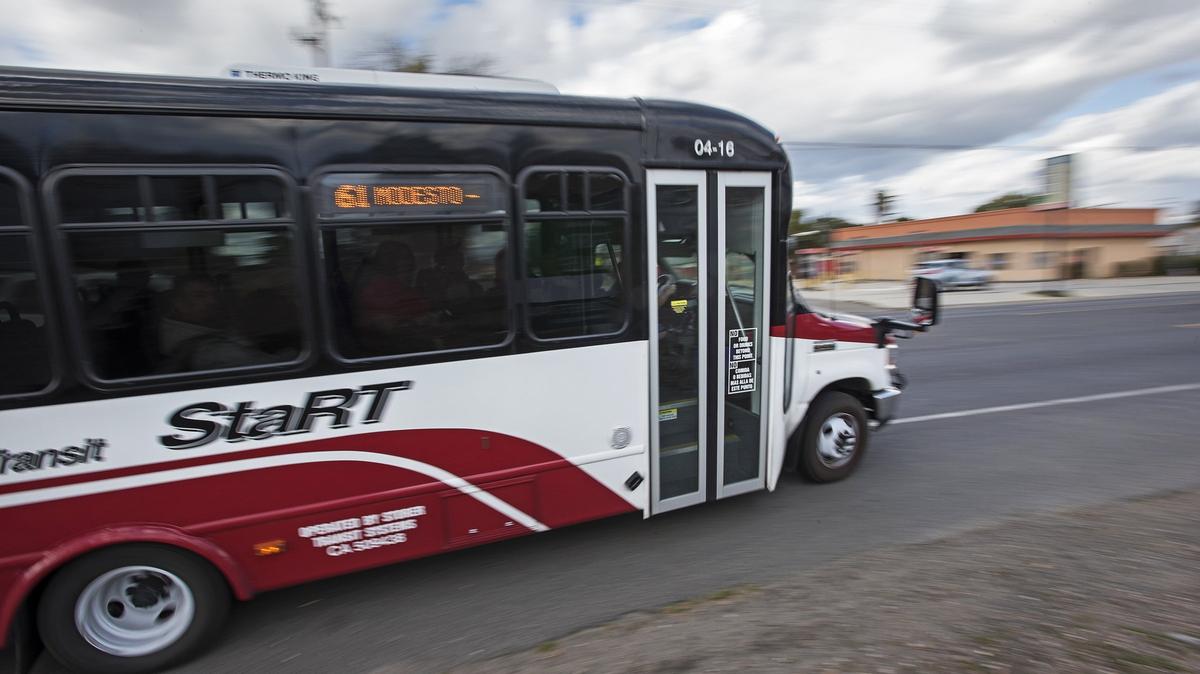 A Stanislaus Regional Transit bus makes a stop on Yosemite Boulevard in Empire on Thursday, Feb. 22, 2018.