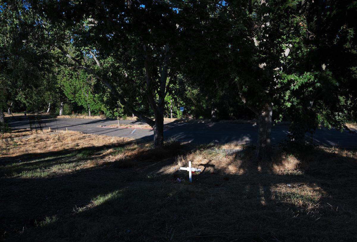The family of Christine Chavez created a memorial for the homeless woman who likely was killed accidentally by a landscaping crew at Beard Brook Park in Modesto, Calif., Friday, July 14, 2023.