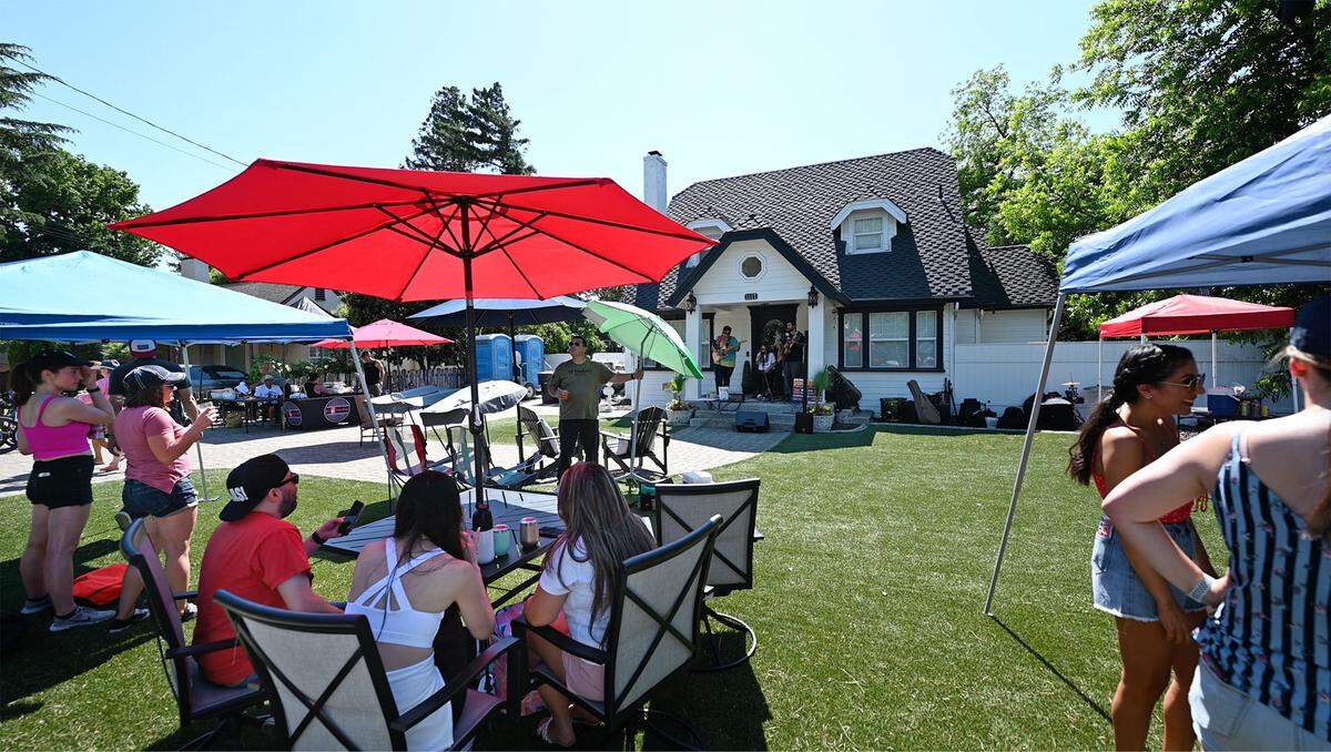 US4Love performs at a home on College Ave during Modesto Porchfest in Modesto, Calif., Sunday, May 21, 2023.