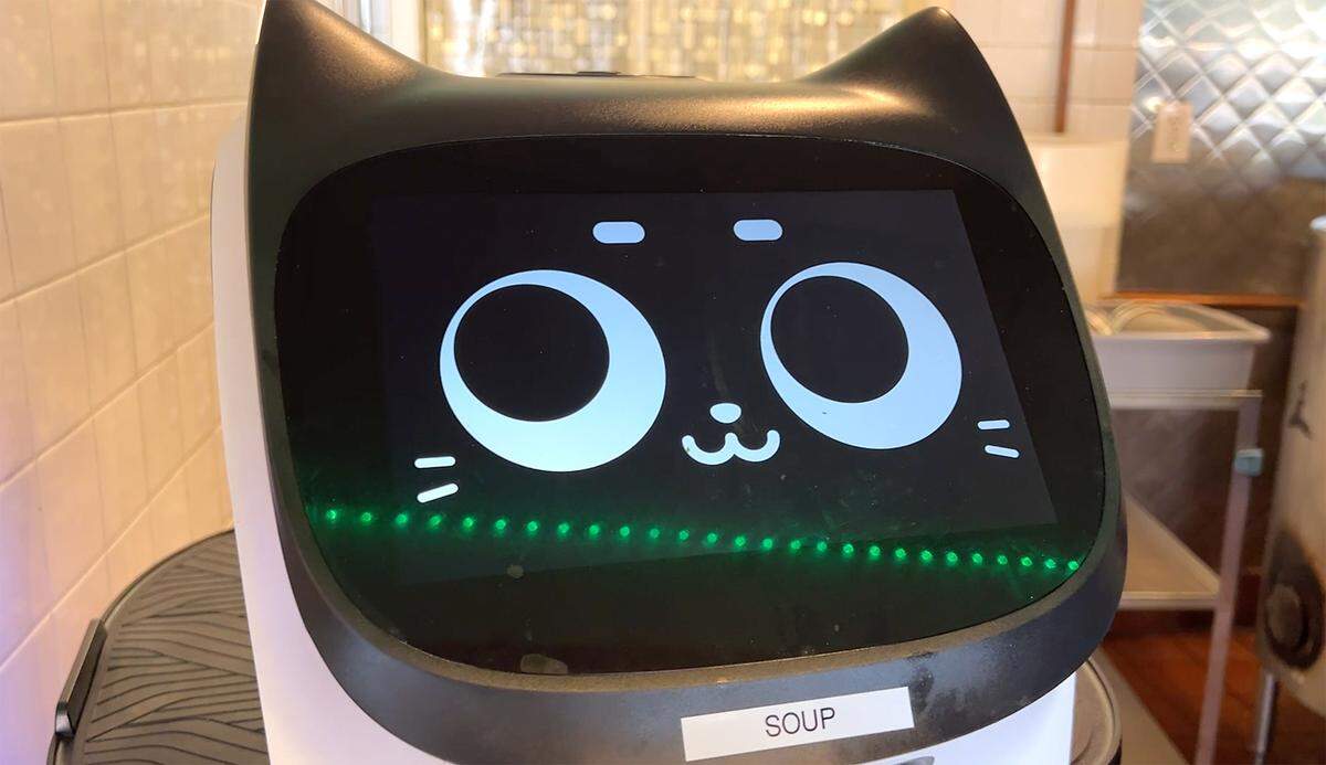 A smiling server robot at Pho Mex restaurant in Modesto, Calif., on Thursday, June, 23, 2022.