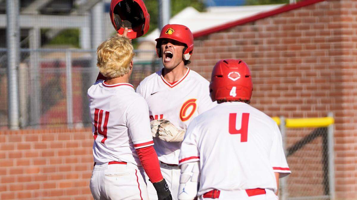 Oakdale’s Landon Schutte celebrates with Jordan Haver, Bas Stice and Eric Velazquez after his fifth-inning home run during the Sac-Joaquin Section Division IV baseball quarterfinals against East Union at Oakdale High School on Friday, May 9, 2025.