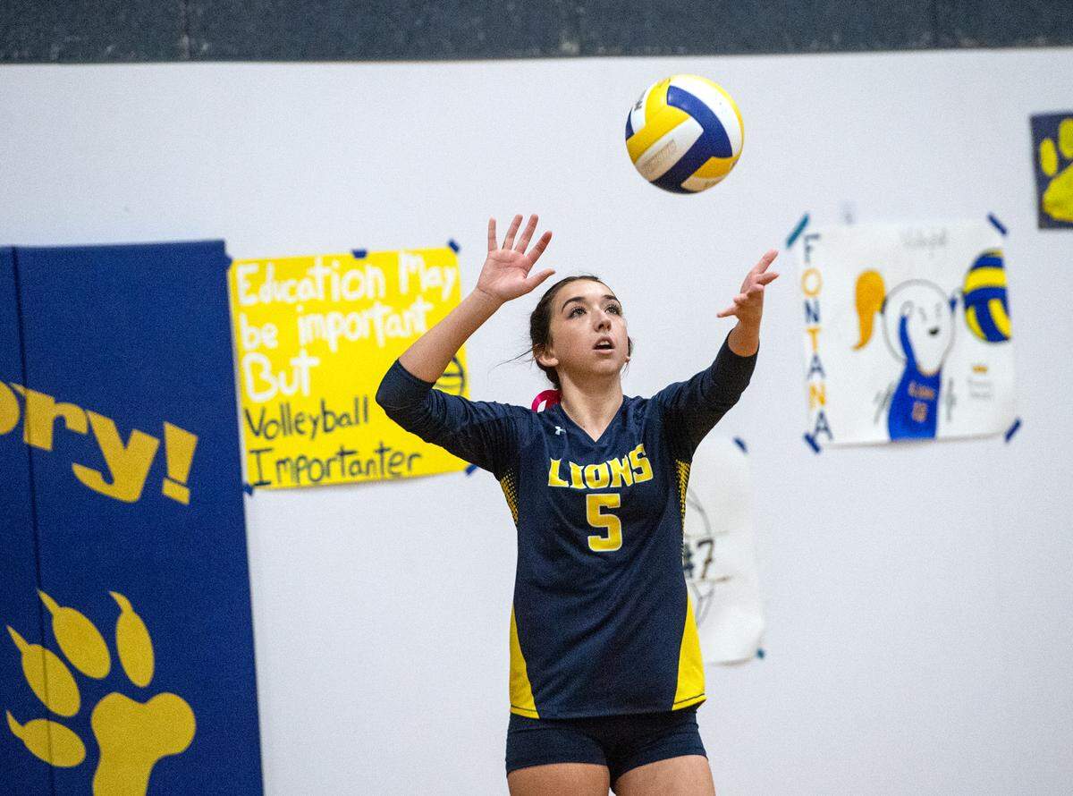 Big Valley Christian’s Cadance Ryland serves the ball during the division 5 CIF Northern California Regional volleyball playoff match with Minarets High School at Big Valley Christian High School in Modesto, Calif., Tuesday, Nov. 8, 2022. Big Valley Christian won the match 3-1.