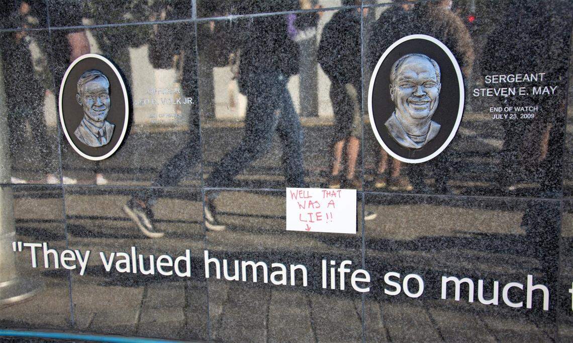 A note left on the Modesto Police Fallen Officer Memorial during a protest of the fatal shooting of Trevor Seever, who was unarmed, by a Modesto officer in Modesto, Calif., on Jan. 9, 2021.