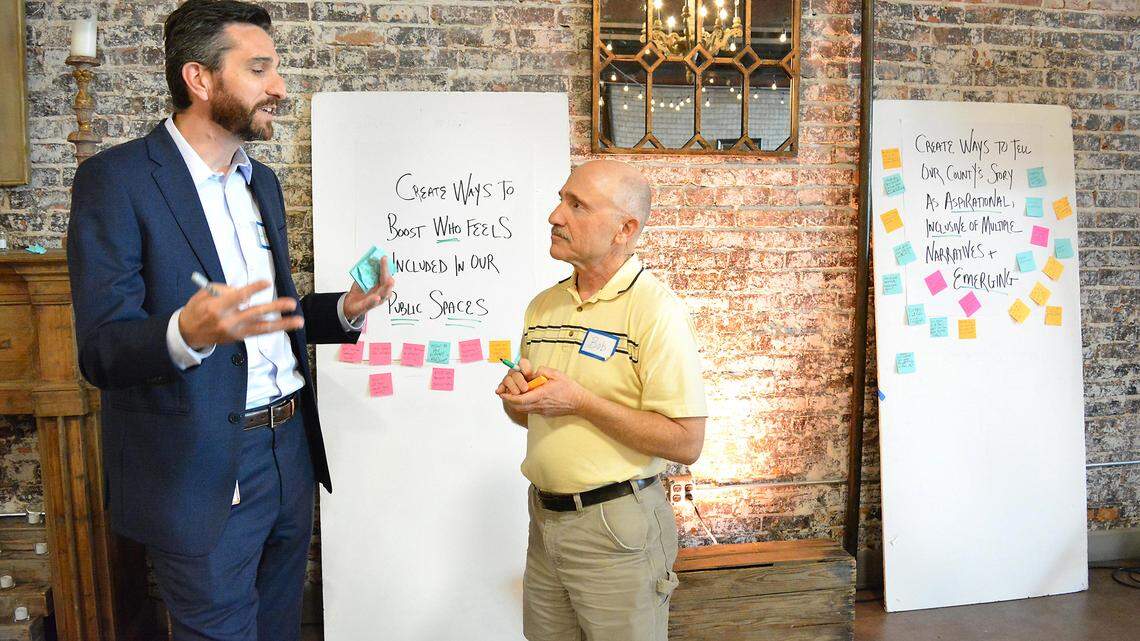 Jaylen French and Bob Barzan brainstorming ideas at Designing the Future of Stanislaus County on Sept. 27 at Greens on Tenth.