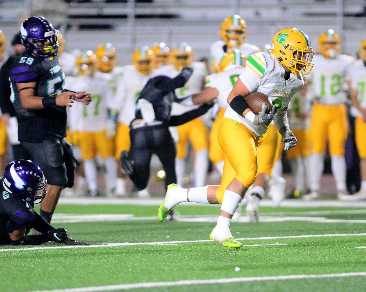 Davis receiver Miguel Olvera Deanda (2) sprints up field to score a touchdown during a game between Johansen and Davis at Johansen High School in Modesto California on November 1, 2024.