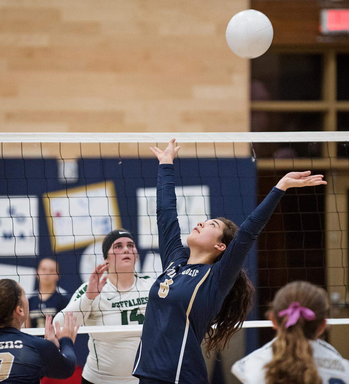 Central Catholic’s Hannah Castillon set the ball during the Valley Oak League match with Manteca at Central Catholic High School in Modesto, Calif., on Thursday, Oct. 4, 2018.