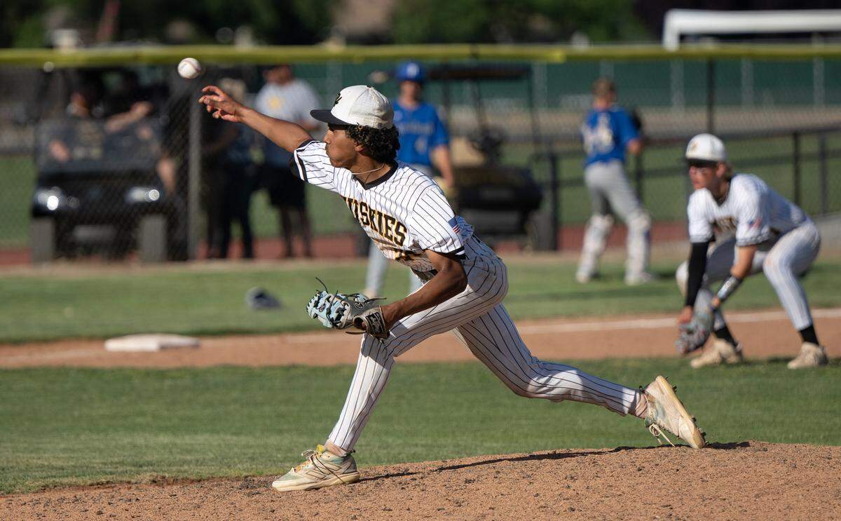 Hughson’s Isaac Lupercio delivers a pitch during the Sac-Joaquin Section Division 5 semifinal playoff game with Wheatland at Hughson High School in Hughson, Thursday, May 15, 2025.