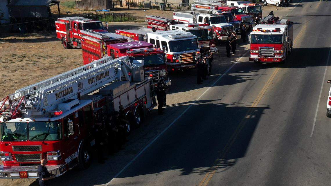 Several Stanislaus Fire Departments lined the streets of Patterson, California as West Stanislaus Fire Protection District firefighter Richard Gerety III of Patterson returned home Thursday Sept. 30, 2021. Gerety suffering third-degree burns on his arms and hands and second-degree burns to his legs well battling the Caldor Fire in El Dorado County. Gerety was treated at UC Davis Medical Center for his burns. Richard Gerety had to undergo skin grafting surgery to several areas he was burned and came home with bandages on his hands that could be seen.  

