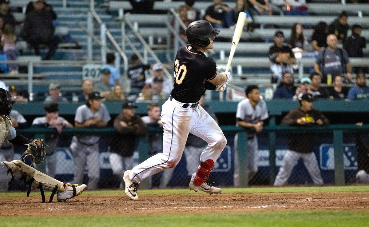 Modesto Nuts’ Josh Caron hits a single to drive in the go-ahead run in the California League Championship game with Lake Elsinore at John Thurman Field in Modesto, Calif., Wednesday, Sept. 18, 2024.