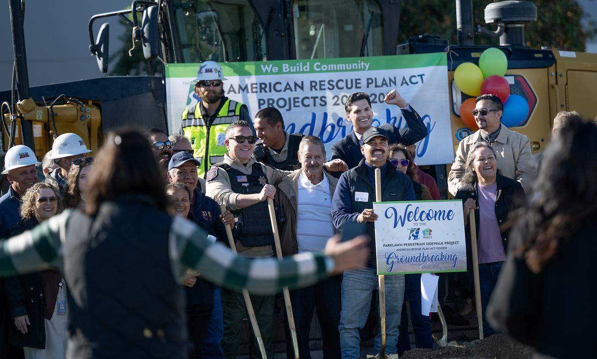 Stanislaus Supervisor Channce Condit, top right, celebrates the start of the Parklawn Pedestrian Sidewalk Project with community members and local officials during a groundbreaking ceremony in Modesto, Thursday, Oct. 16, 2025. 