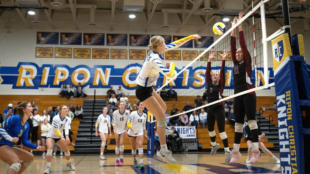 Ripon Christian’s Alyssa Hofman spikes the ball past West Valley defenders during the CIF State Division 4 playoff game at Ripon Christian High School in Ripon on  Tuesday, Nov. 12, 2024. Ripon Christian won the match 3-0.