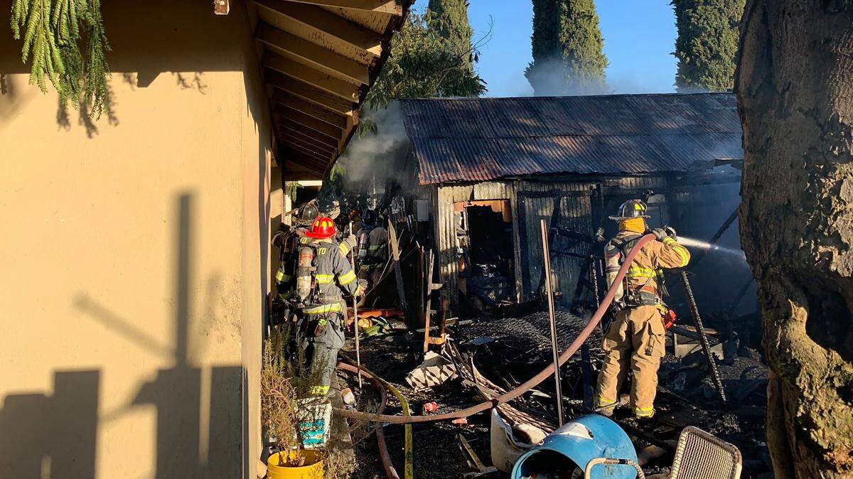 A fire destroyed a mobile home, garage and vehicle on the 100 block of I Street in Waterford, California, on Wednesday, June 19, 2019.