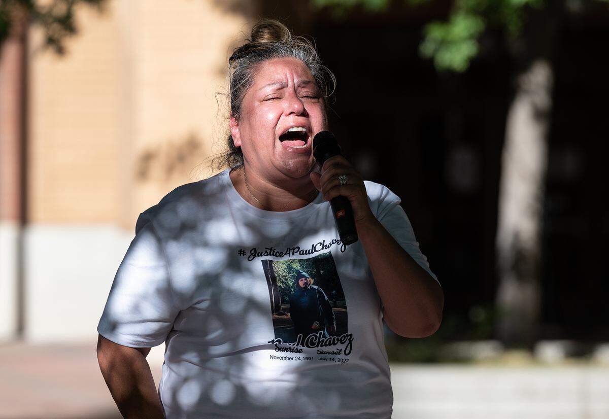 Teresa Clutter protests the July 14th shooting of Paul Chavez Jr. by the Modesto Police, in Modesto, Calif., on August 23, 2022. Family members marched from police headquarters to10th Street Place and spoke before the Modesto City Council asking that officers involved to be prosecuted.