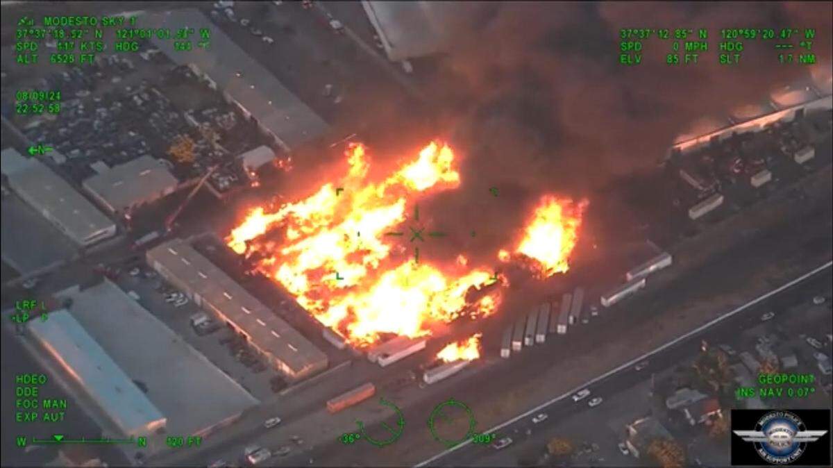 A screenshot of aerial footage from the Modesto Police Department of a fire on the 600 block of Janopaul lane in Modesto on Friday, Aug. 09, 2024.