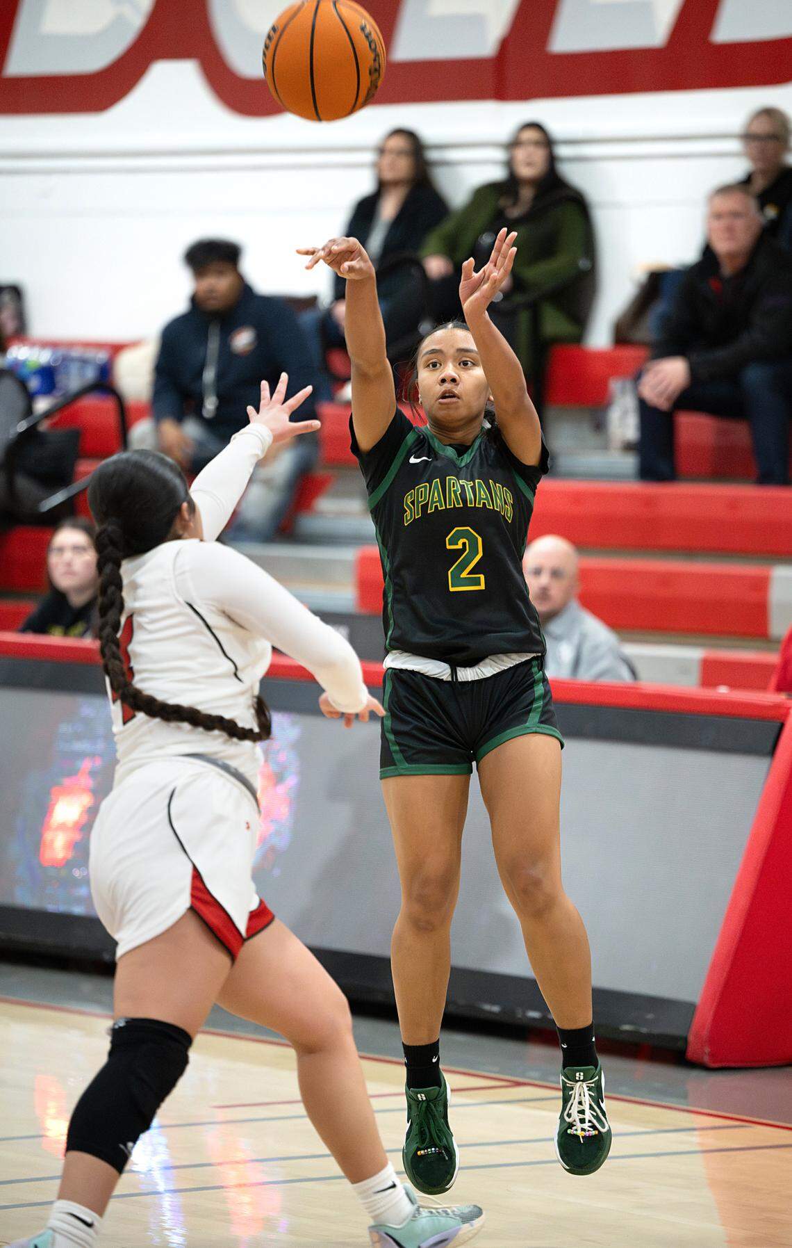 Grace Davis’ Kaliyanei Saykao attempts a three point shot during the Western Athletic Conference game with Ceres at Ceres High School in Ceres, Thursday, Jan. 16, 2025.