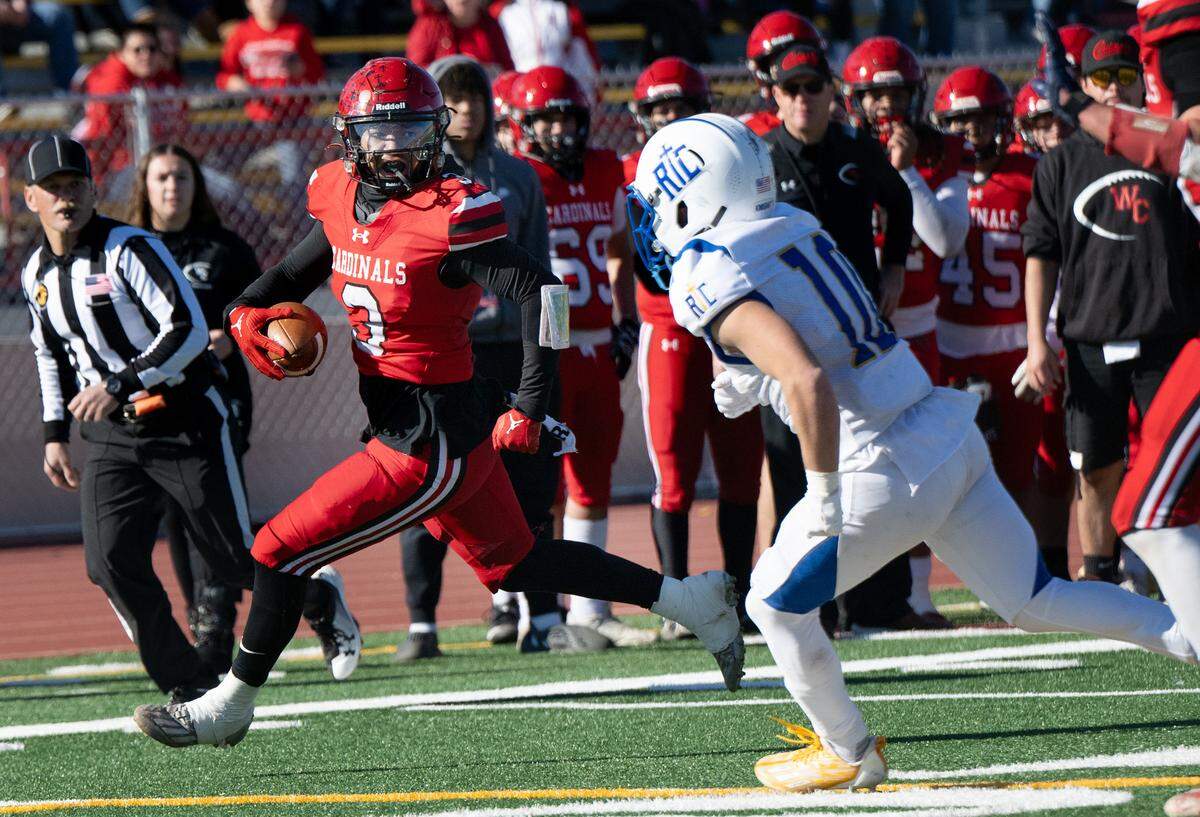 Woodland Christian’s Noah Hinkle runs the ball for a touchdown in the Sac-Joaquin Section Division VII NorCal Qualifier with Ripon Christian at Sacramento City College in Sacramento, Calif., Saturday, Nov. 25, 2023.