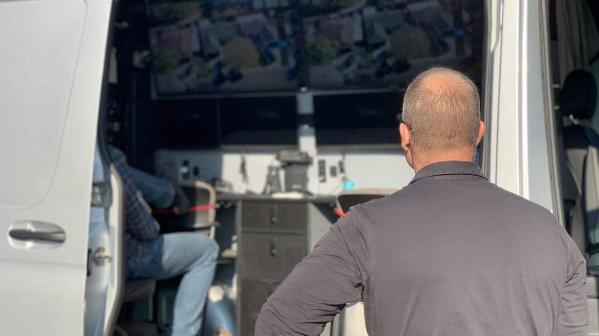 Stanislaus County Sheriff Jeff Dirkse watches as a search warrant is served Friday Nov. 12, 2021, in Patterson. Two people were arrested in connection with the stabbing death of a 17-year-old the month before.