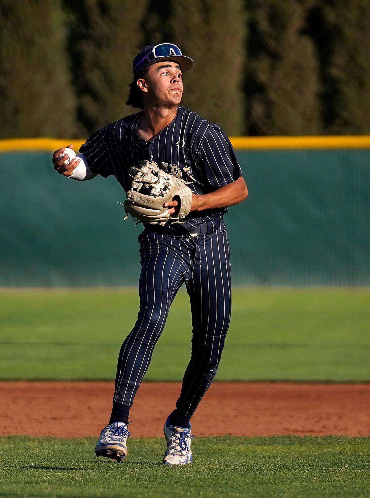Central Catholic’s Marcus Davenport makes a play at second base during the Sac-Joaquin Section D-III championship game with Yuba City at Sacramento City College on Wednesday, May 21, 2025.