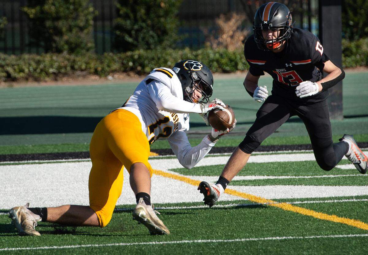 Abraham Montes makes a catch to set up a Hughson touchdown during the Sac-Joaquin Section Division VI championship game with Summerville at St. Mary’s High School in Stockton, Calif., Saturday, Nov. 26, 2022.