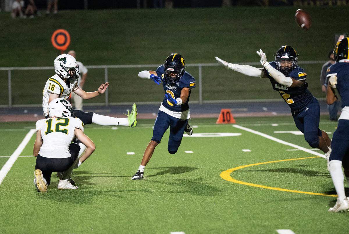 Gregori’s Alton Williams, right, blocks a Livermore field goal attempt during the game at Gregori High School in Modesto, Calif., Friday, September 8, 2023. Gregori won the game 41-17.