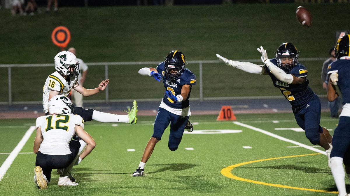 Gregori’s Alton Williams, right, blocks a Livermore field goal attempt during the game at Gregori High School in Modesto, Calif., Friday, September 8, 2023. Gregori won the game 41-17.