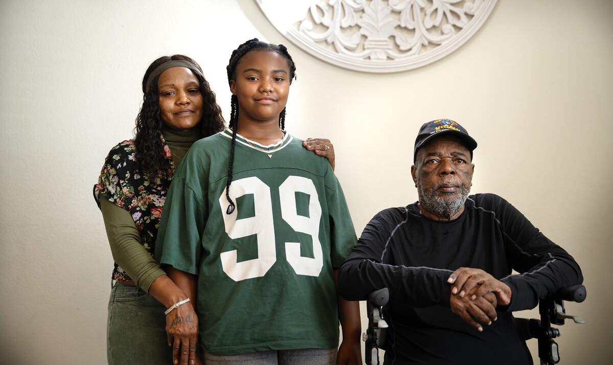 Creekside Middle School student Calaya Hawkins, 12, with her mom Lanisha Hawkins and uncle Percy Jones.