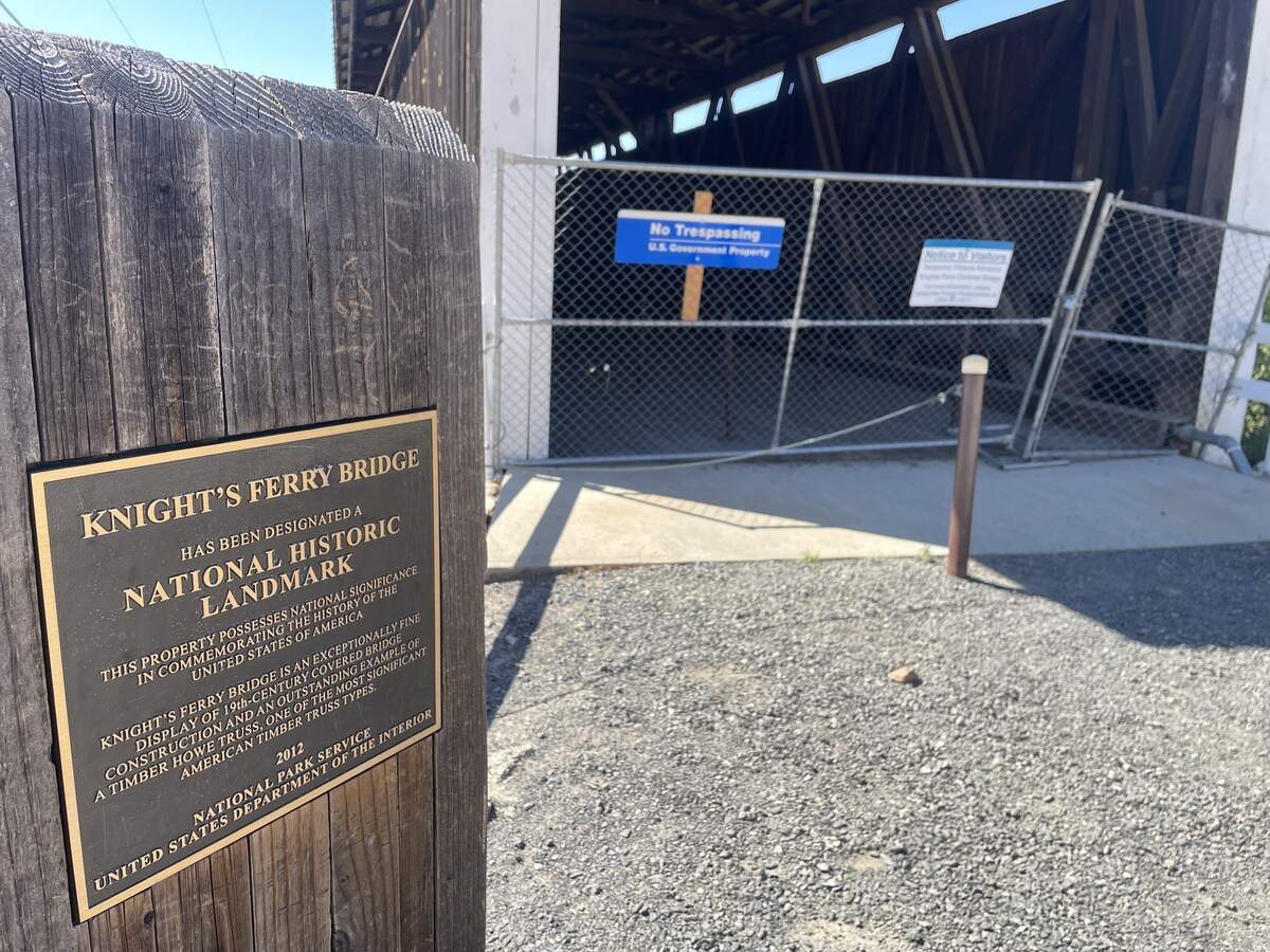 The covered bridge across the Stanislaus River in Knights Ferry is not expected to reopen for several years. Photographed June 14, 2026.