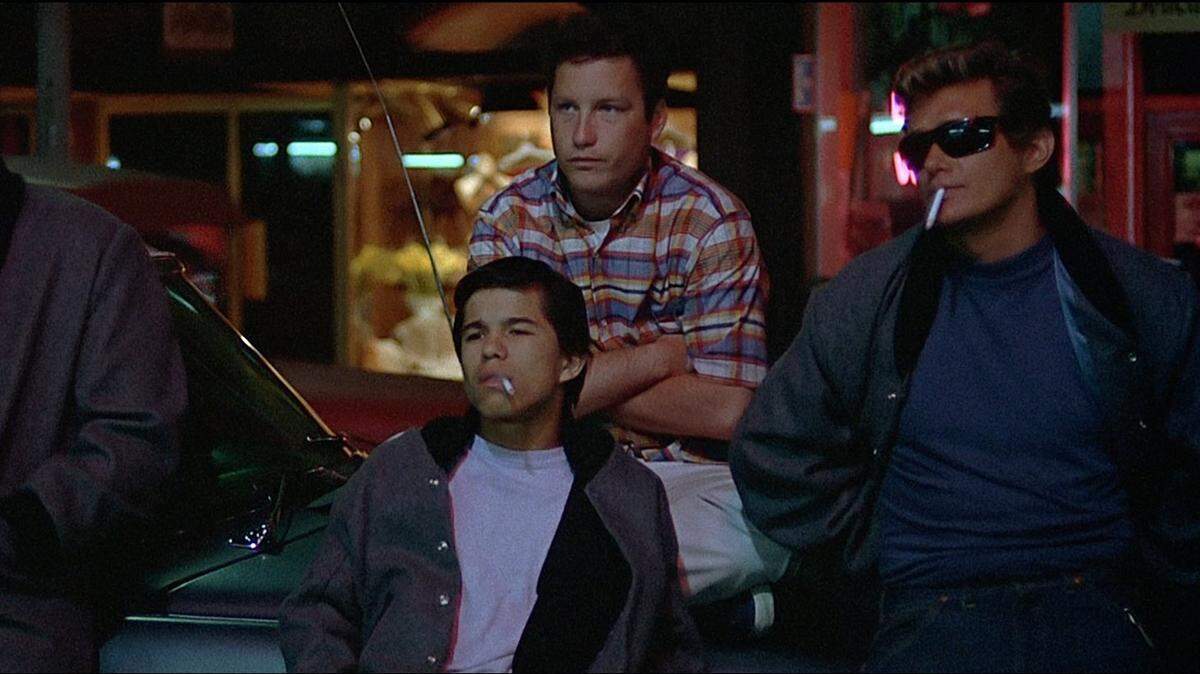Manuel Padilla Jr. (front center), Richard Dreyfuss and Bo Hopkins appear in a scene from George Lucas’ 1973 film, “American Graffiti.”