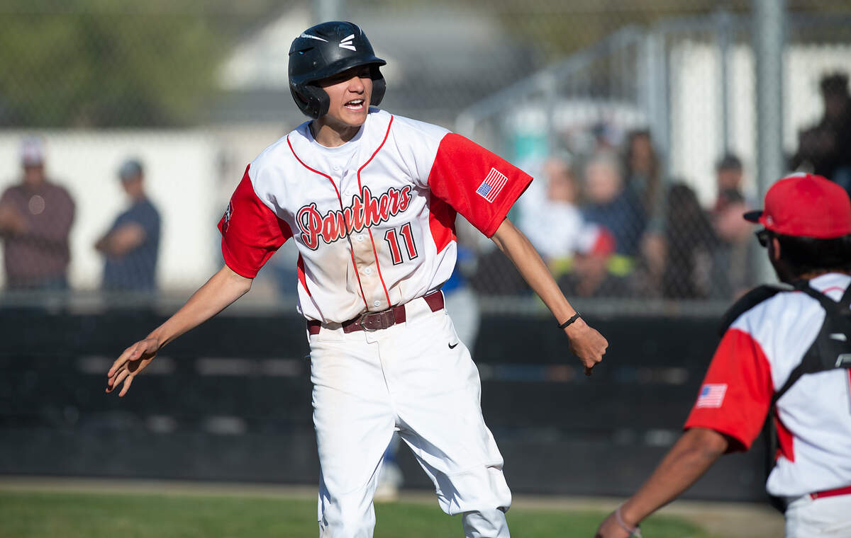 Modesto’s Jeffrey Weber reacts to scoring on a passed ball in the Windemuth Tournament championship game with Ripon Christian at Modesto High School in Modesto, Calif., Thursday, April 13, 2023. Modesto won 6-3.