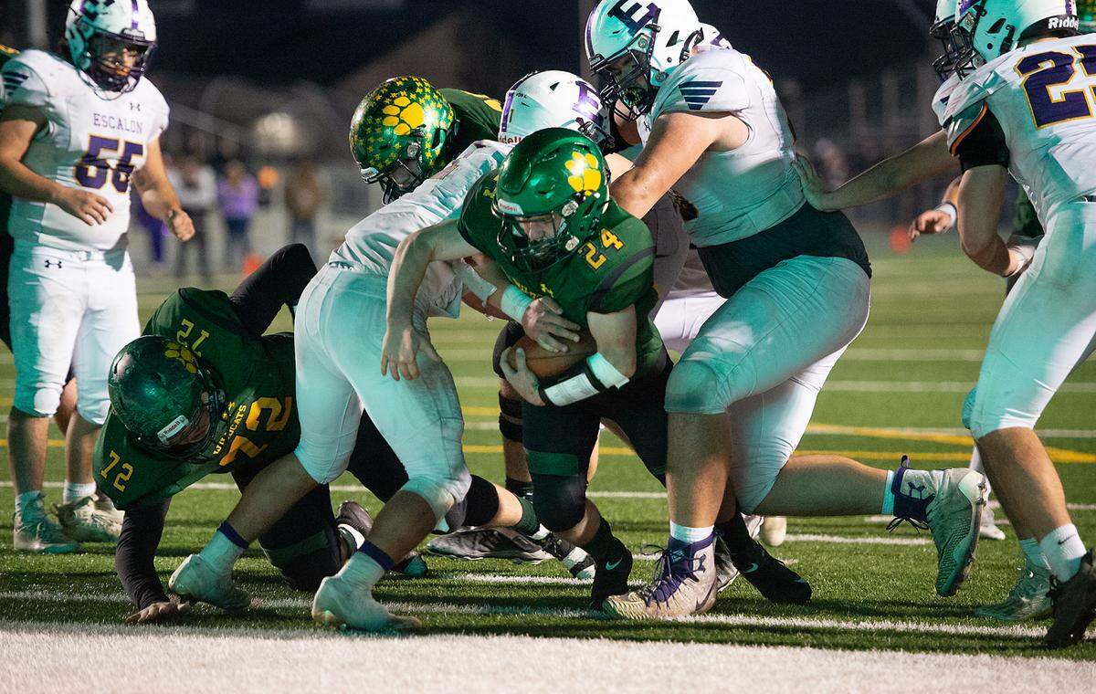 Sonora’s Audie Peeples runs the ball in for a touchdown during the Sac-Joaquin Section Division V championship game with Escalon at St. Mary’s High School in Stockton, Calif., Saturday, Nov. 26, 2022.